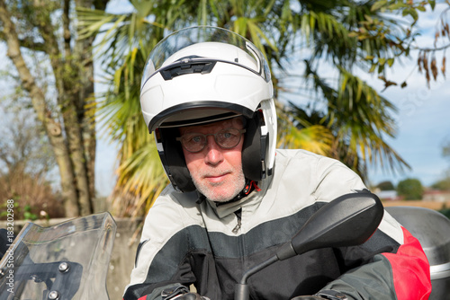 portrait of a senior biker on his motorcycle © Philipimage