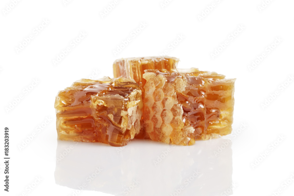 three pieces of honeycom isolated on white three pieces of honeycom isolated on white