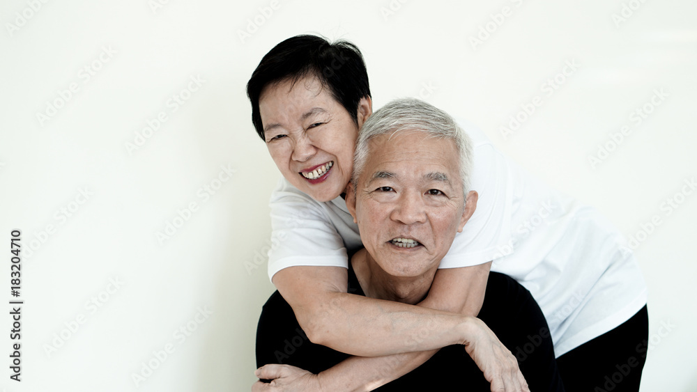 Asian senior couple smile, life with no worry on white background Asian senior couple smile, life with no worry on white background