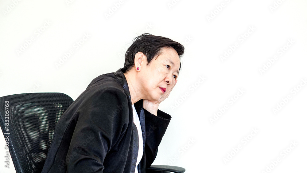 Asian senior business woman sit on chair thinking about management Asian senior business woman sit on chair thinking about management