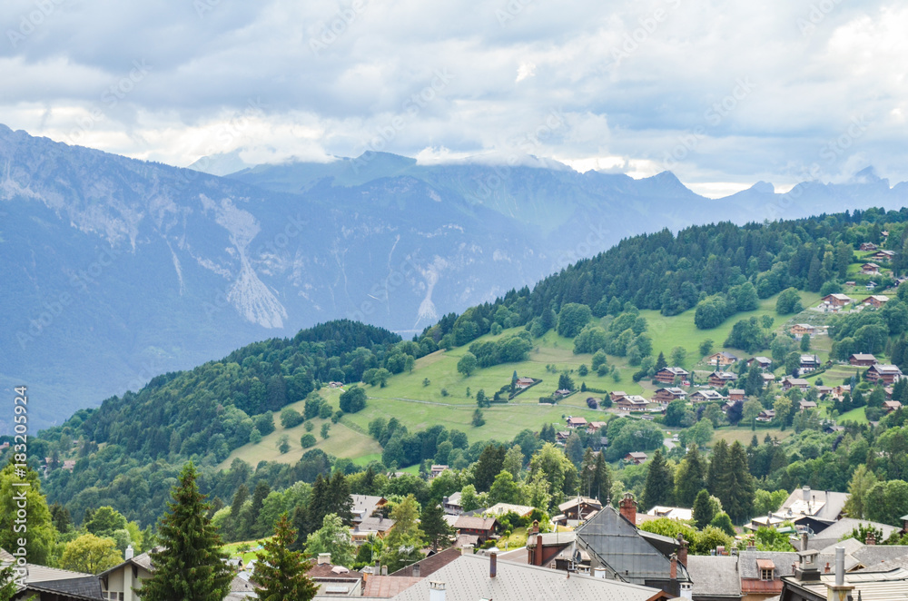 Villages with mountain background in Switzerland.