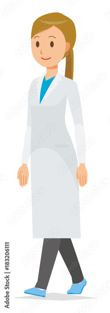 A woman doctor wearing a white suit is walking