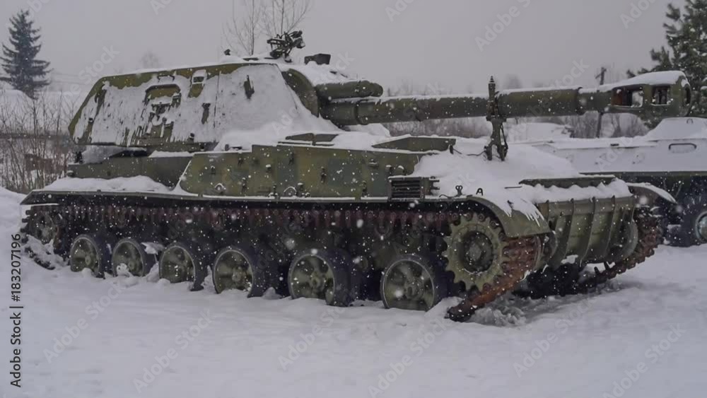 Snowfall on the tank background Snowfall on the tank background
