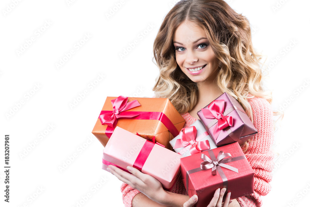 Happy attractive woman holding big pile of gifts. Happy attractive woman holding big pile of gifts.