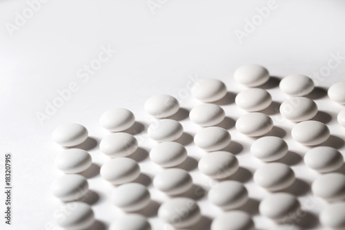 Fototapeta Naklejka Na Ścianę i Meble -  White pills close-up.