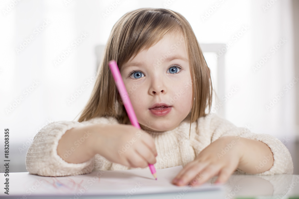 Girl draws a picture