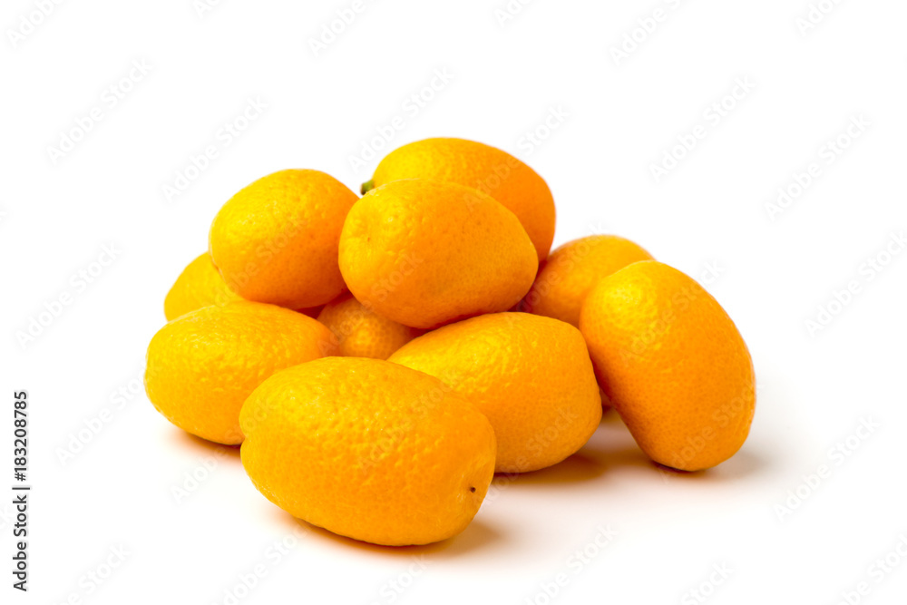 A bunch of ripe kumquat on white A bunch of ripe kumquat on white