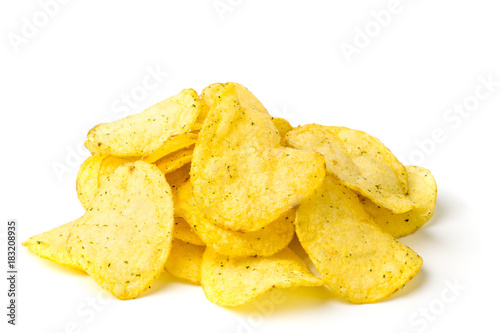 A bunch of potato chips on white