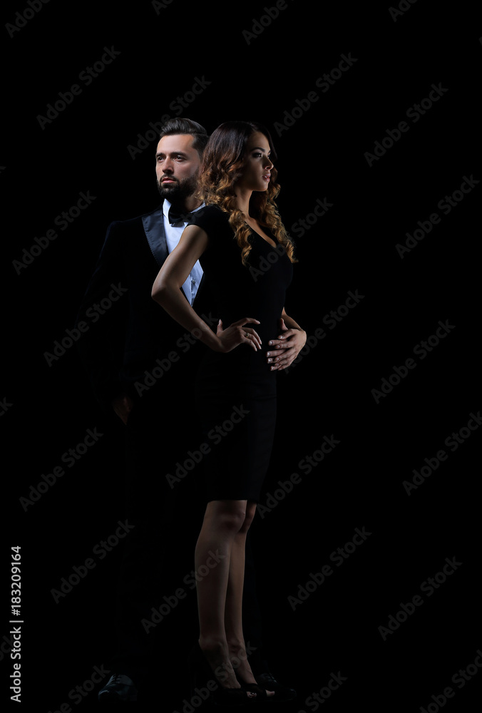 Hot girl in a black dress next to a businessman Hot girl in a black dress next to a businessman