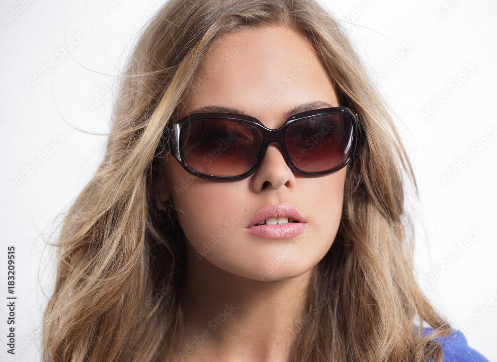 Close up young woman wearing the big modern sunglasses Close up young woman wearing the big modern sunglasses
