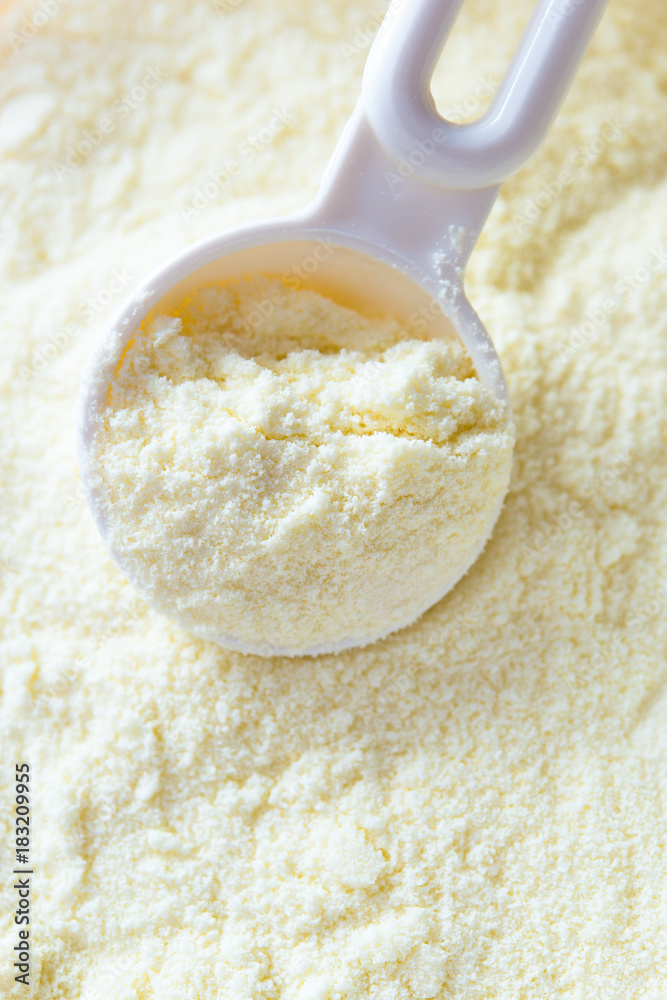 Powdered milk with spoon for baby Powdered milk with spoon for baby