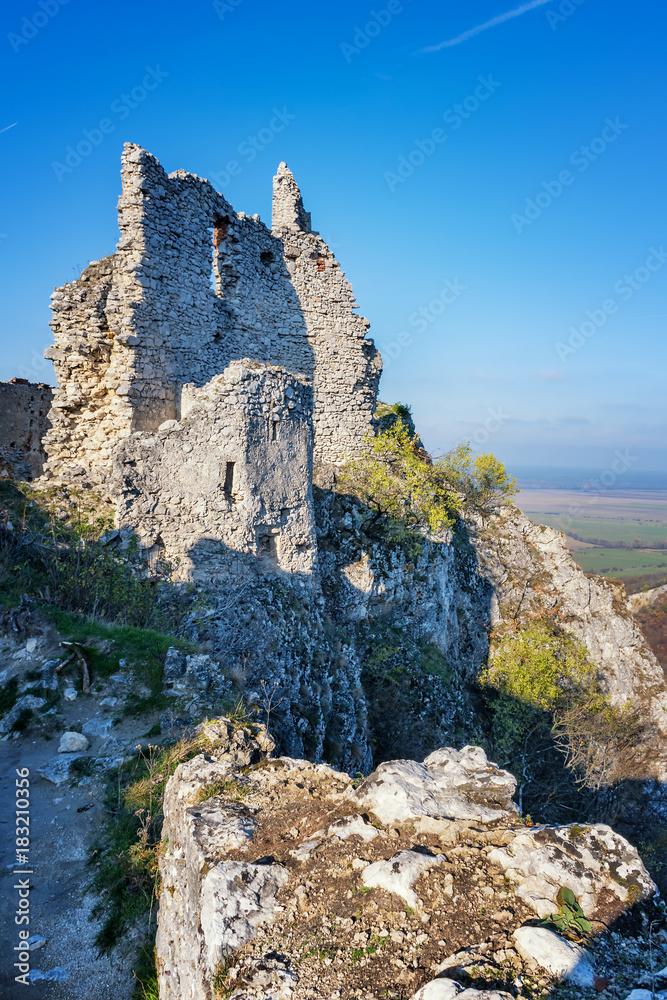 Abandoned ruins of medieval Plavecky castle in autumn