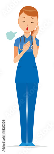 A female nurse wearing a blue scrub is sighing