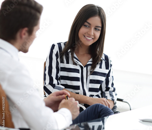 female Manager talking to the client.