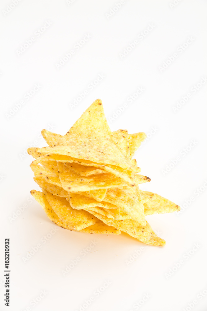 Naklejka premium Crispy nacho chips, on white background.