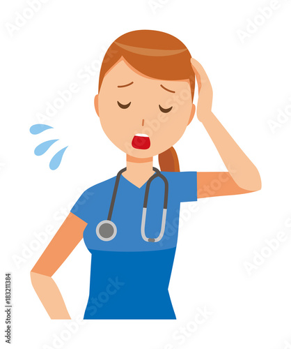 A woman nurse wearing a blue scrub is tired