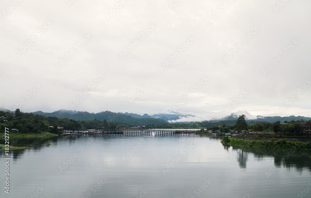 Landscape of The wooden bridge (Mon bridge) at Sangkhlaburi, Kanchanaburi,Thailand. It's the second longest wooden bridge in the world..