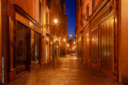 Bologna. Old street at night.