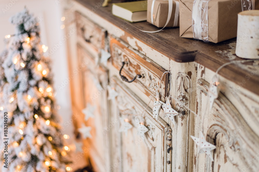 Christmas star and other decoration on ancient commode. Happy new year conception Christmas star and other decoration on ancient commode. Happy new year conception