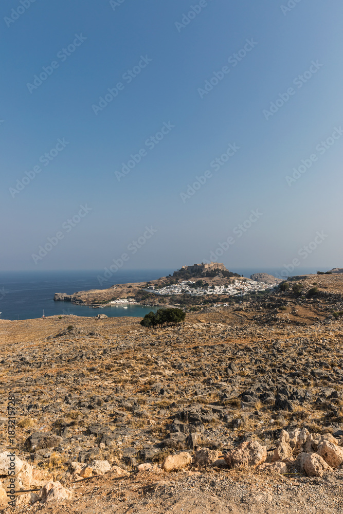 Acropolis, the second largest and most significant in Greece, and white houses in Lindos on the island of Rhodes