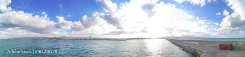 Panorama port Heraklion, Crete. Beautiful Sky with clouds and rays of the sun.