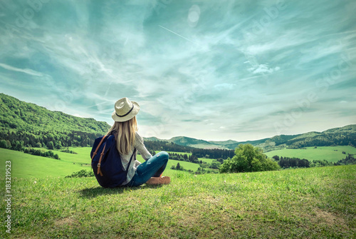 Fototapeta Woman leasure and relaxing around the mountains with beautiful g