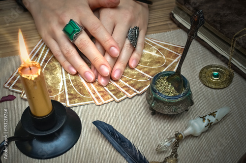 Tarot cards on fortune teller desk table. Future reading.