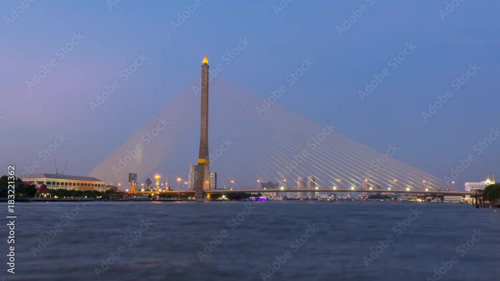 Time lapse day to night of Big Suspension bridge with lighting in night time / Rama 8 bridge in night time