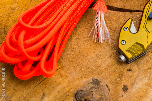 Cullet and Cutters for survival in an emergency. Orange rope. photo