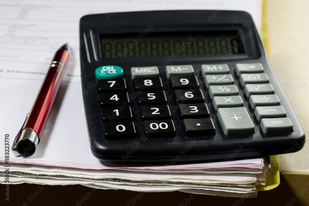 Bills, documents and papers with calculator. Office of the accounting office. Bills, documents and papers with calculator. Office of the accounting office.