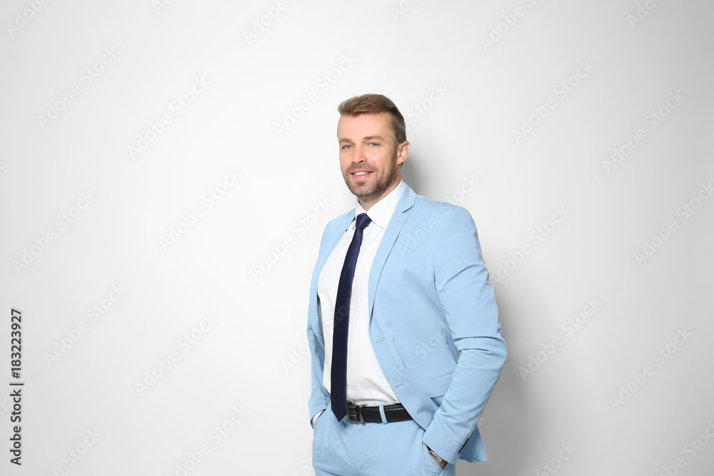 Attractive man in formal suit on white background Attractive man in formal suit on white background