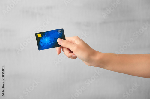 Hand of woman with credit c...