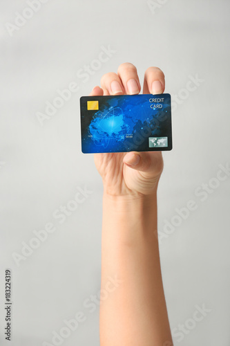 Hand of woman with credit c...