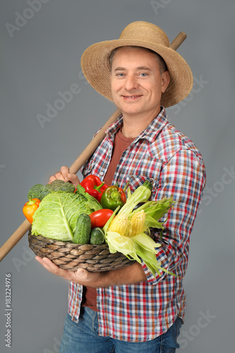 Agronomist with fresh veget...