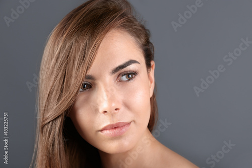 Beautiful young woman with ...