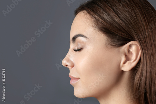 Beautiful young woman with ...