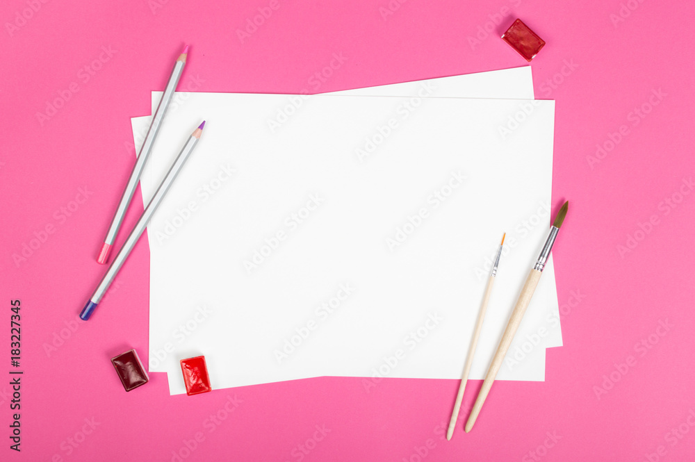 Mock up. Tools for painting on pink background: watercolor, paper and brush. horizontal Mock up. Tools for painting on pink background: watercolor, paper and brush. horizontal