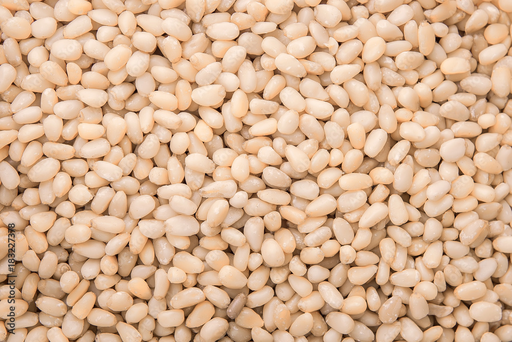 Pine nuts top view. Background, texture. Pine nuts top view. Background, texture.