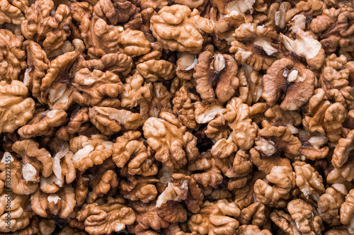 Walnuts close-up top view. Background, texture.