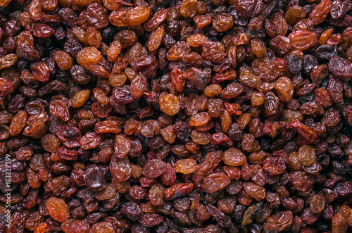 Raisins close-up top view. Background, texture. photo
