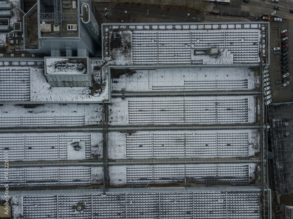 Aerial view of snow covered roof of industry building Aerial view of snow covered roof of industry building