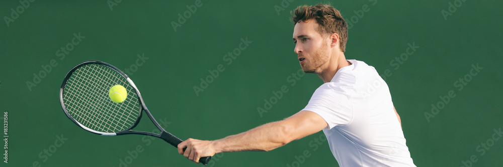 Tennis player hitting ball with backhand racket on hard court. Man playing game returning ball on panorama banner. Sports and fitness active lifestyle. Tennis player hitting ball with backhand racket on hard court. Man playing game returning ball on panorama banner. Sports and fitness active lifestyle.