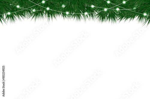 Christmas and New Year background with fir branches and christmas garland. Background with christmas tree and lights