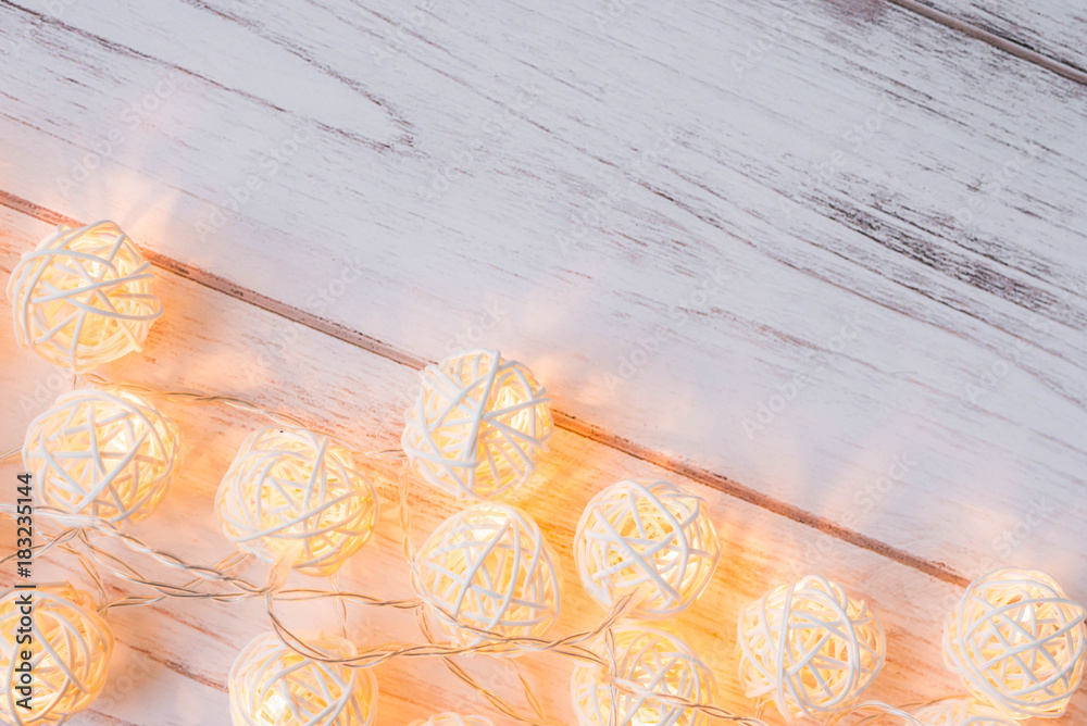 Glowing Christmas garlands round balls made of rattan
