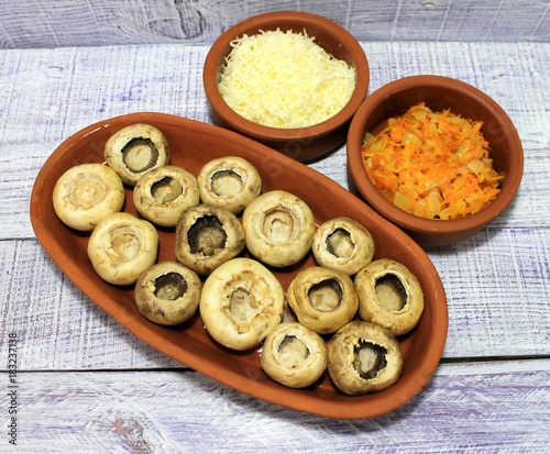 Ingredients for dish mushrooms stuffed with vegetables and cheese