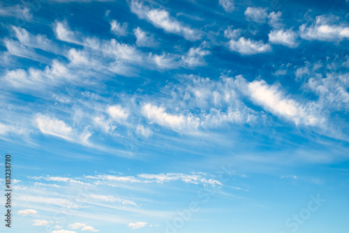Blue sky with large cumulus clouds