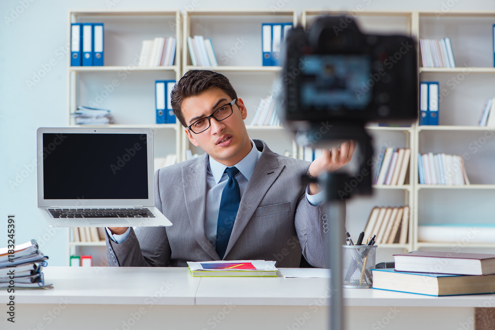 Business blogger doing webcast for his subscribers