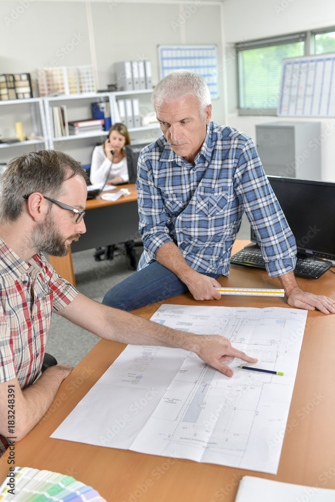 Boss discussing with an employee Boss discussing with an employee