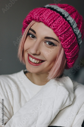 Girl in pink knitted hat