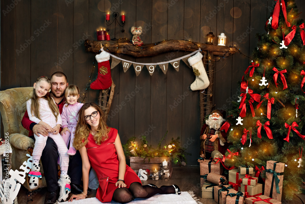 New Year and Christmas 2018. Family fun opening Christmas presents New Year and Christmas 2018. Family fun opening Christmas presents